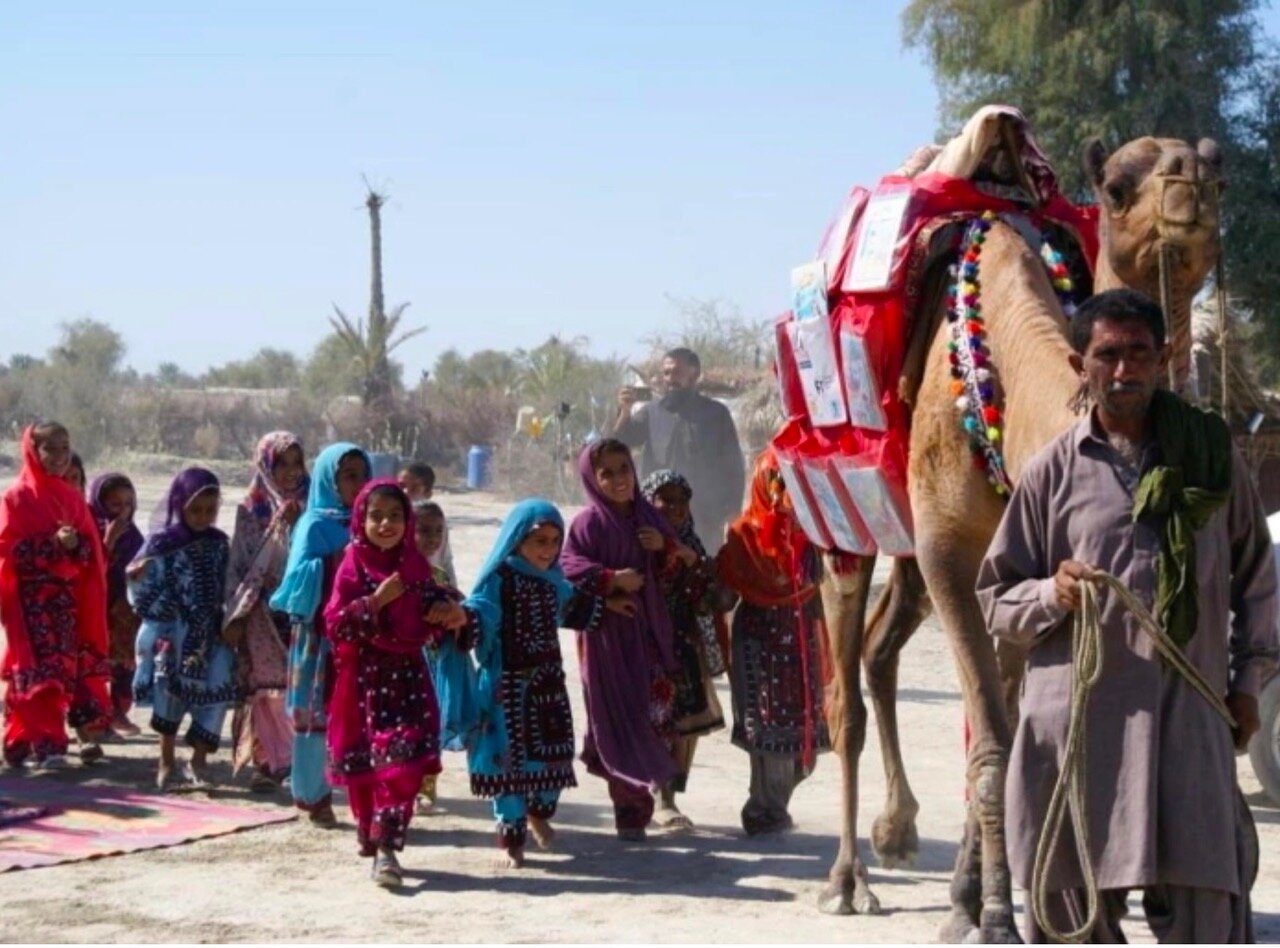 Roshan the camel brings books to homeschooling children in rural Pakistan