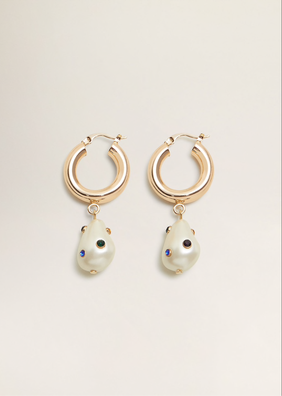   MANGO Pearl earrings, $36.23  