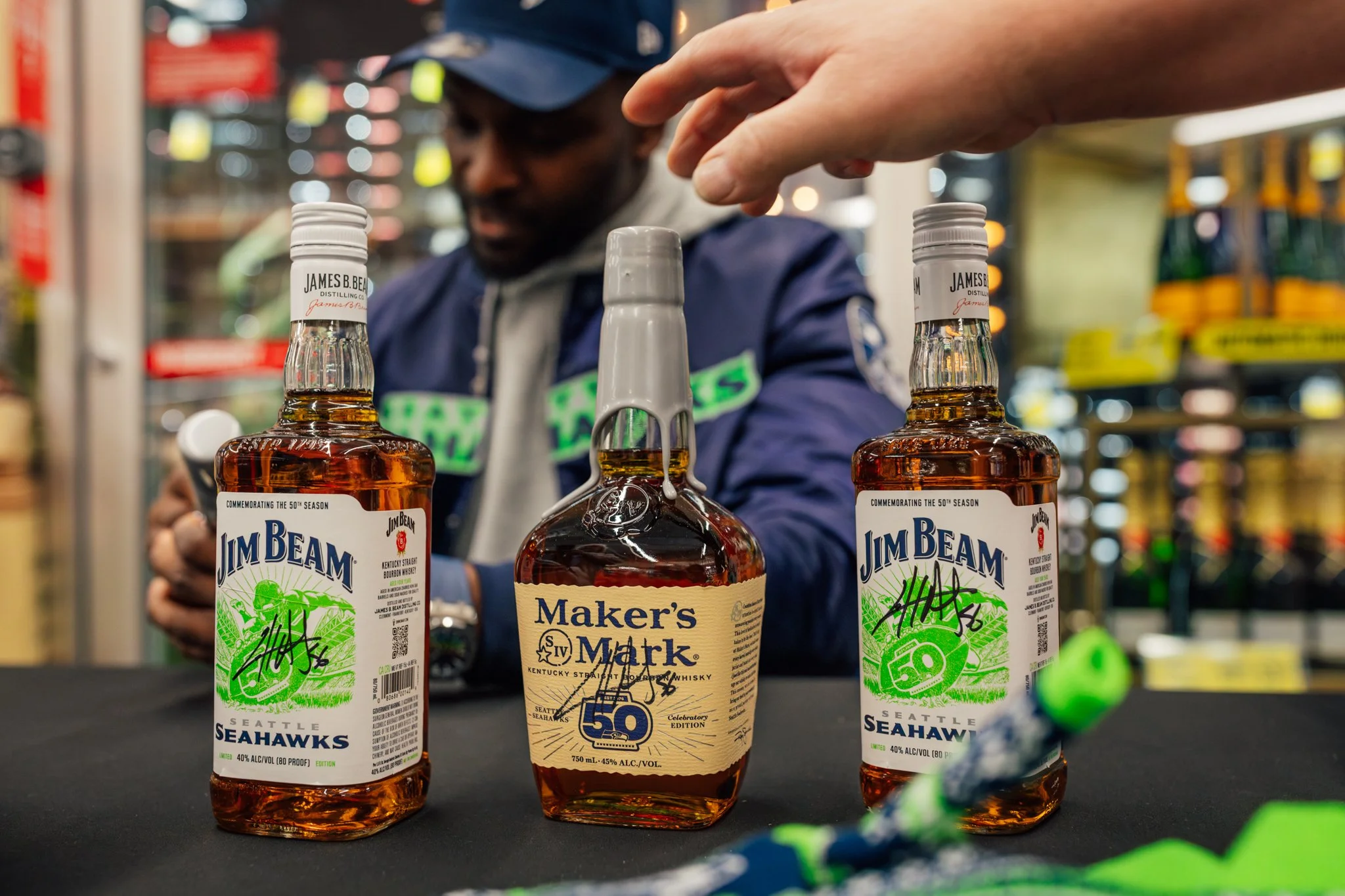 makers_mark_jim_beam_seahawks_safeway_kirkland_cliff_avril_12.13.25-0462.jpg