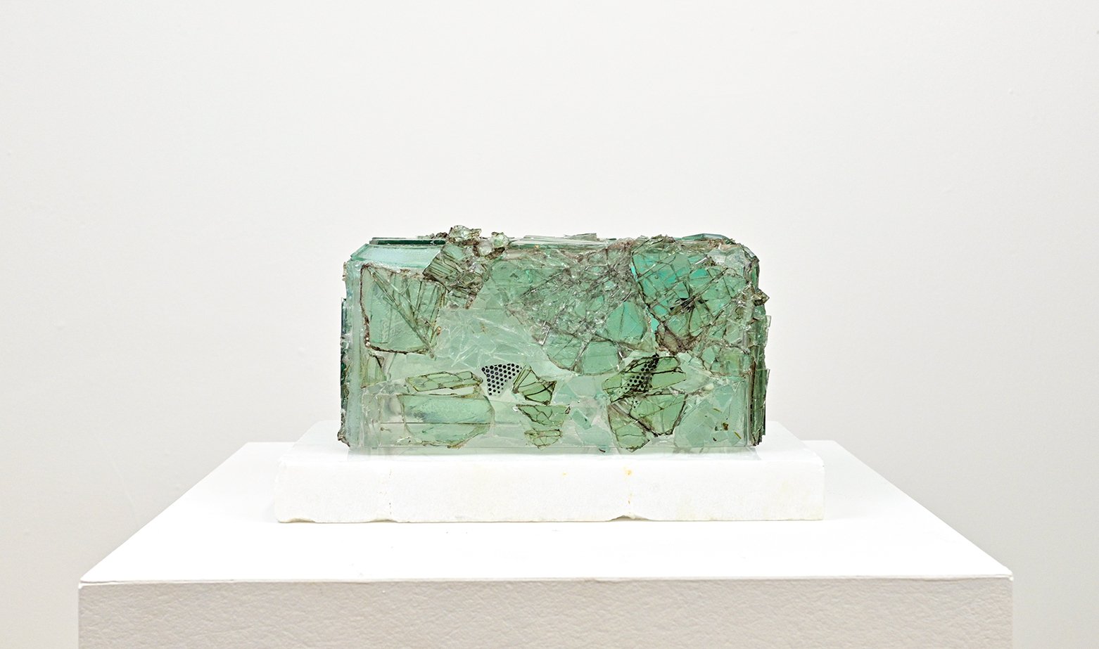   Satori , Salvaged automobile windshield glass (1940s-2010) and acrylic on raw cut found marble slab. 10” x 6” x 5½”    
