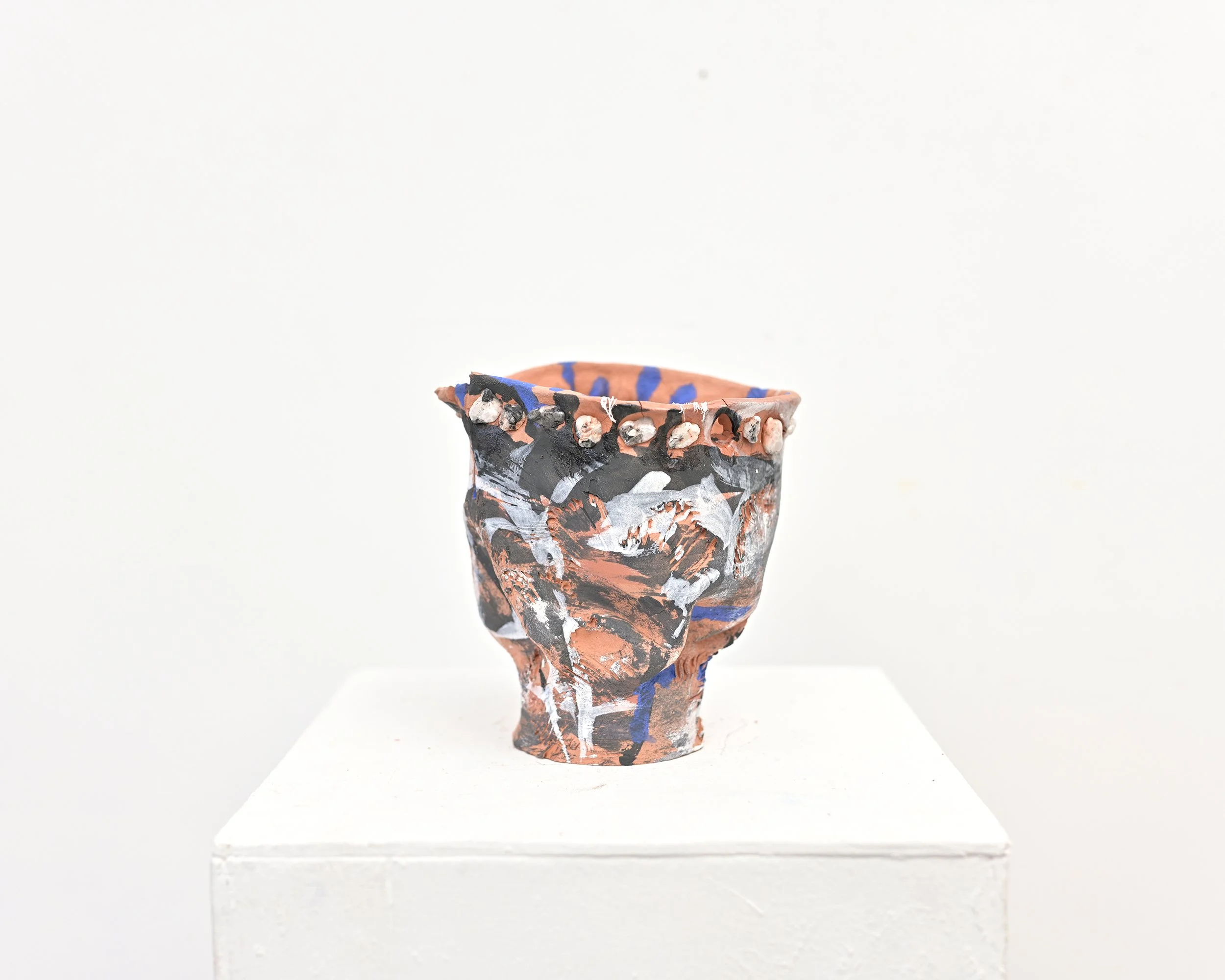   Canyon forces , earthenware, found rocks, glaze, palm leaves, 6.5” x 6” x 6”, 2024 