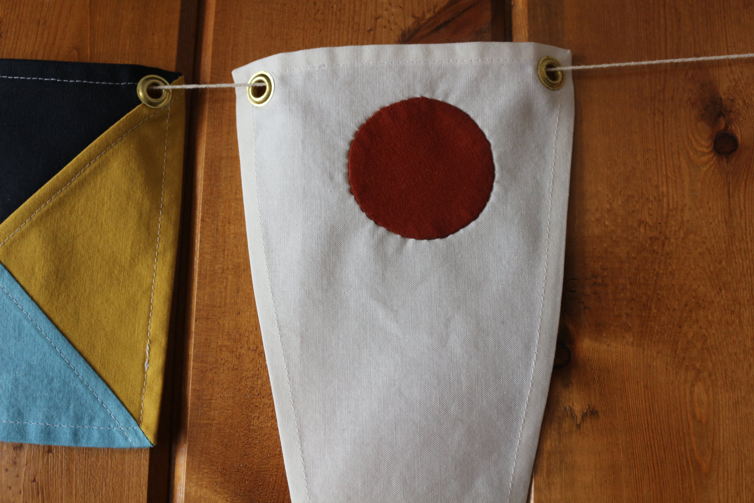 Applique detail on "1" flag