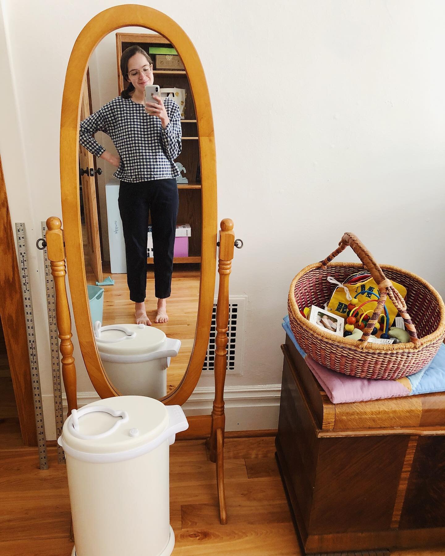 hi! 👋 30 weeks pregnant + wearing an old favorite #allwellboxtop and the only pants I own that are still comfy (secondhand @eileenfisherny !) + diaper pail + baby toys. switched the sewing room into the nursery last weekend, somehow consolidated all