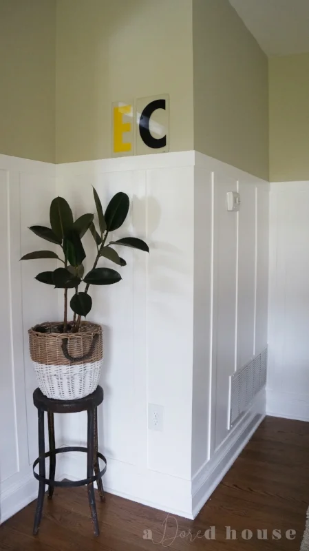 See how the board and batten runs above the thermostat? 100% intentional!
