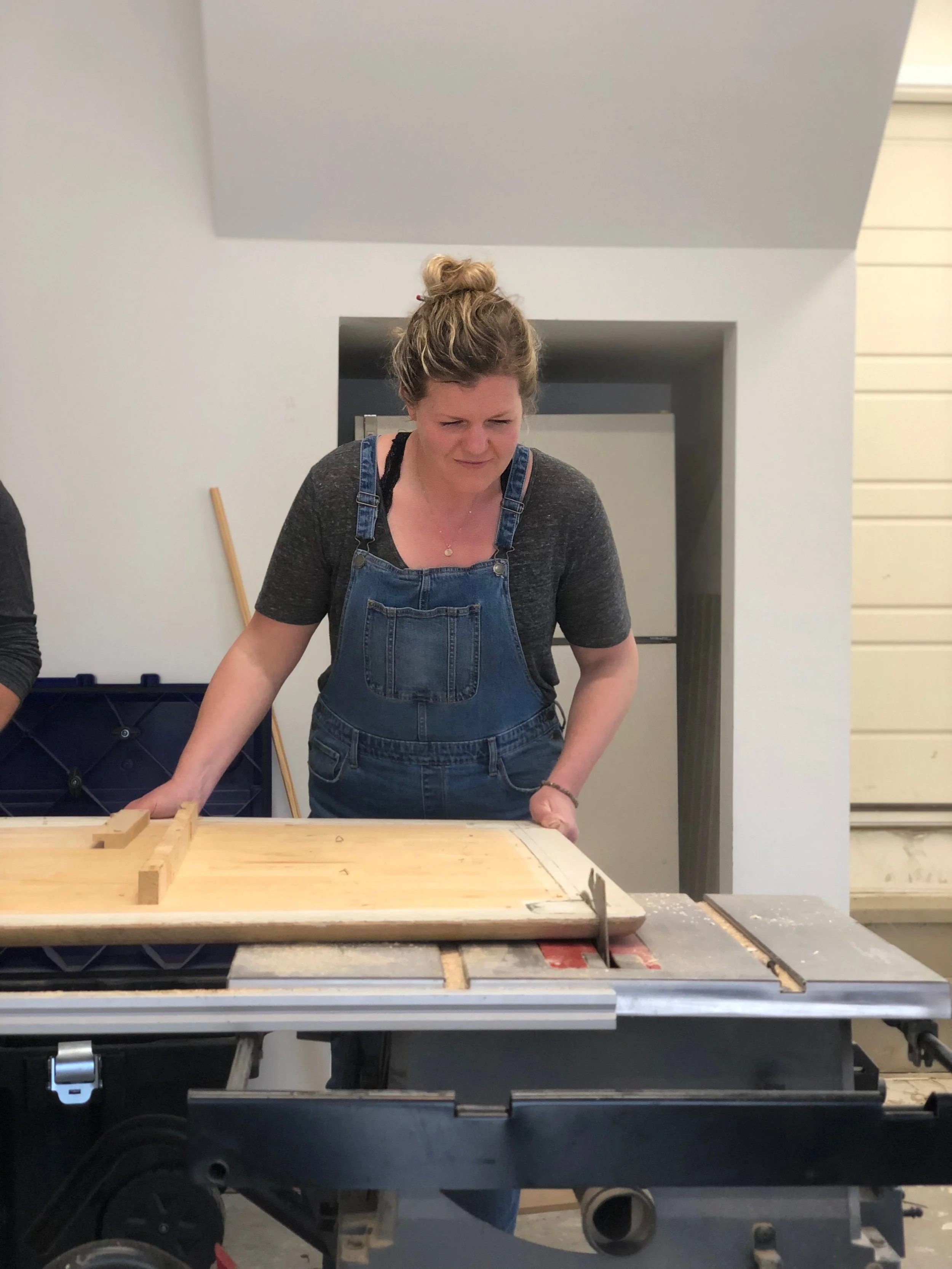 Cutting down the table. Please disregard the lack of safety glasses! Photo by Deb