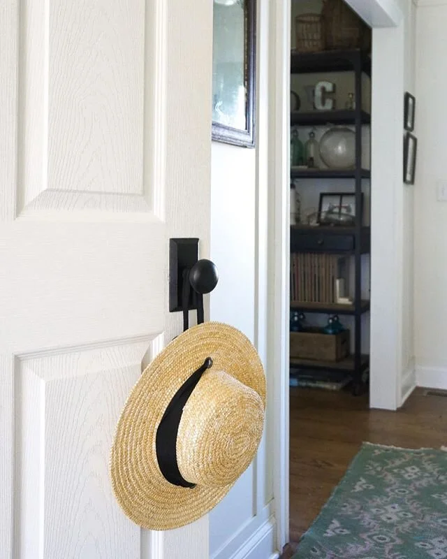 Our main hallway was one of the first projects I tackled after we moved in. It was so dark, and beige, and lacked character. It&rsquo;s been a work in progress for 4 years, and it recently received a door hardware upgrade that took it from a 6 to a 9