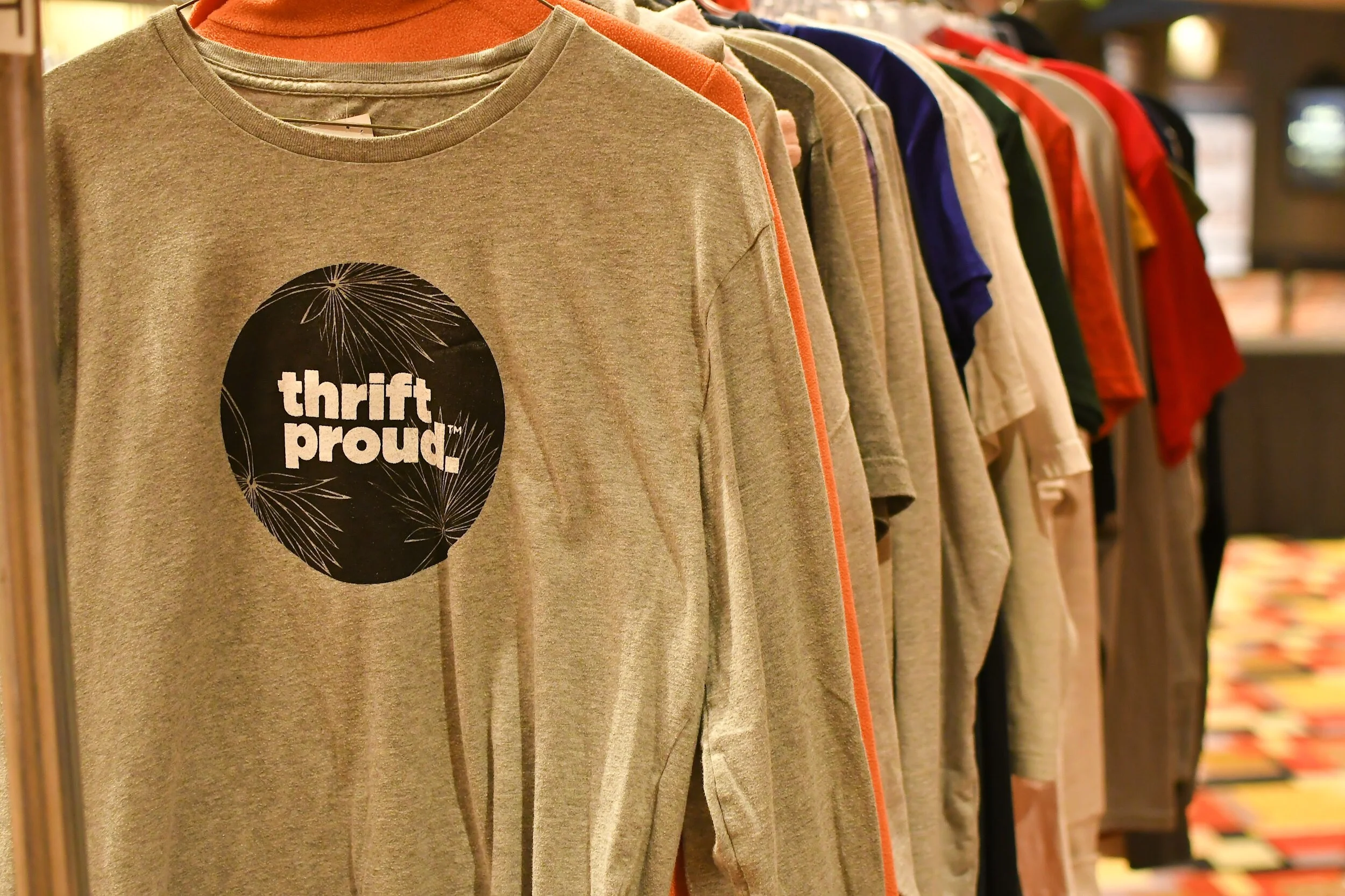 rack of ThriftProud tees.jpg