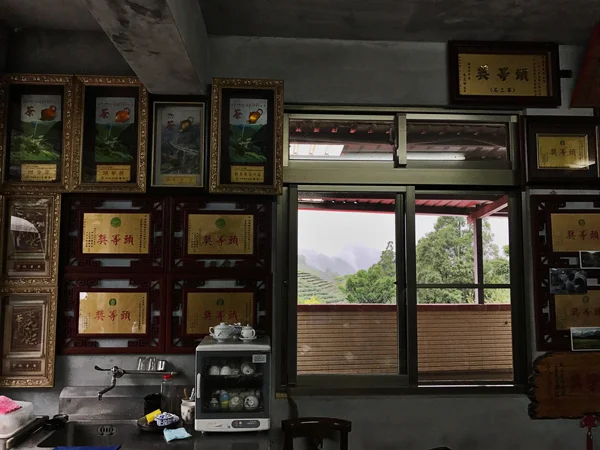 A corner of Bai's tasting room, with a window looking out to the gardens.