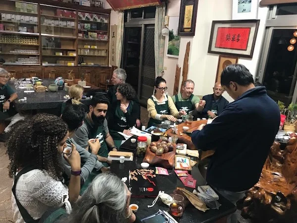 New tea friends late-night tasting with tea master, while our leaves are processing!
