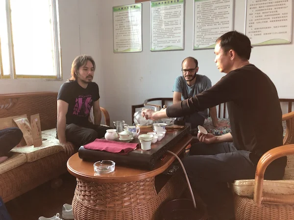 Tasting Tea Master Rao's wonderful tai cha, at magic hour... SoHan, Nat, and Rao, perched for the best.