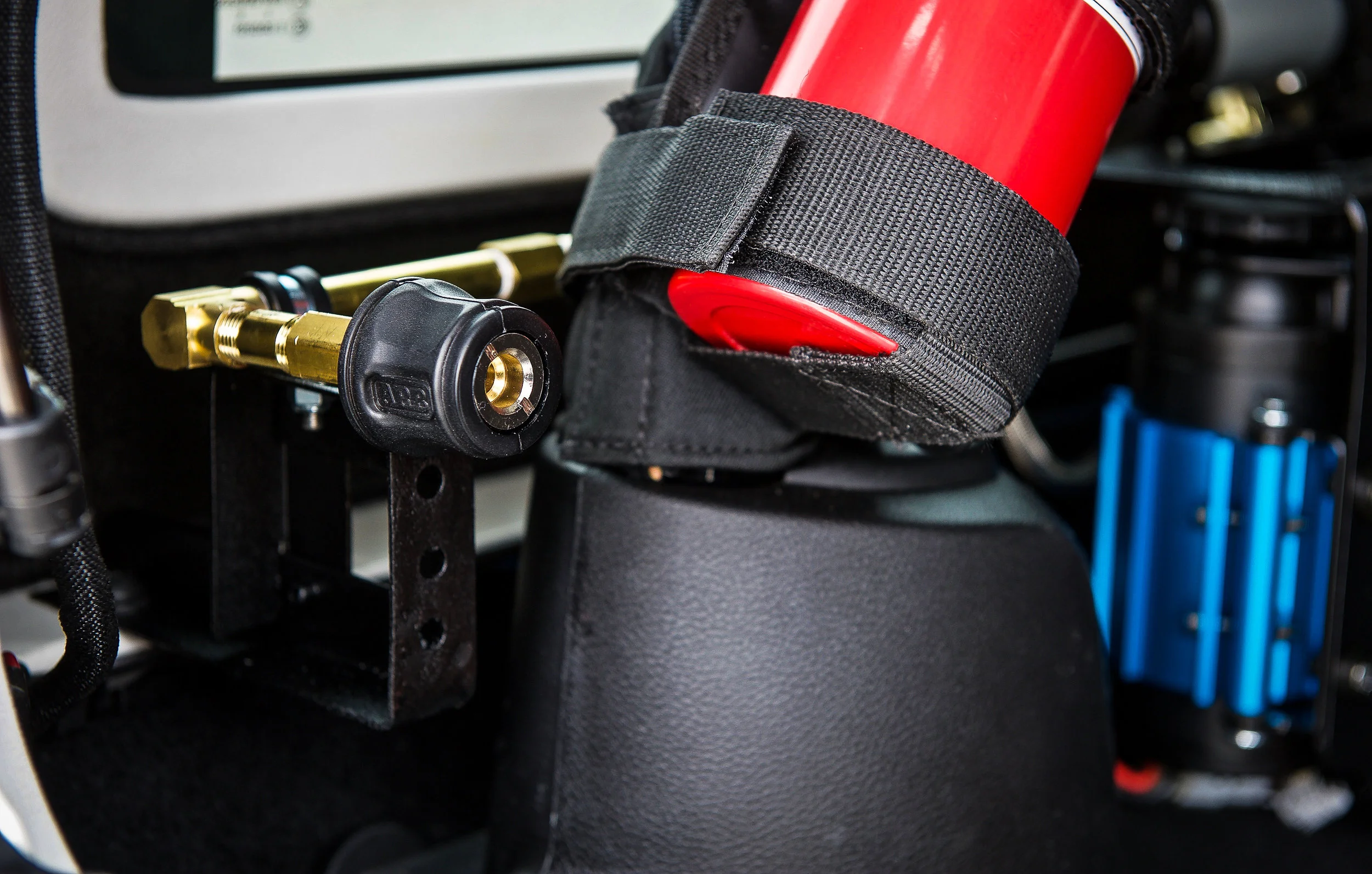 The bracket bolts in using the existing Hard Top bolt...