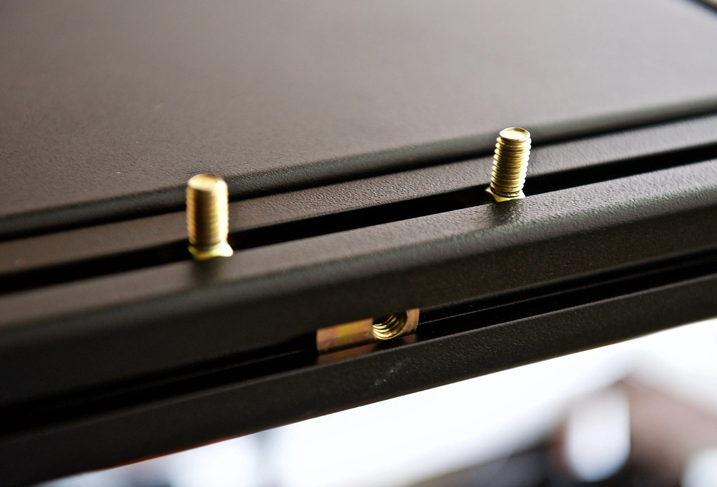 Here you can see how the rack provides adjustability for the grab bars, load bars, etc. While loose, you can simply slide the Grab Handles, accessories to where you want them...