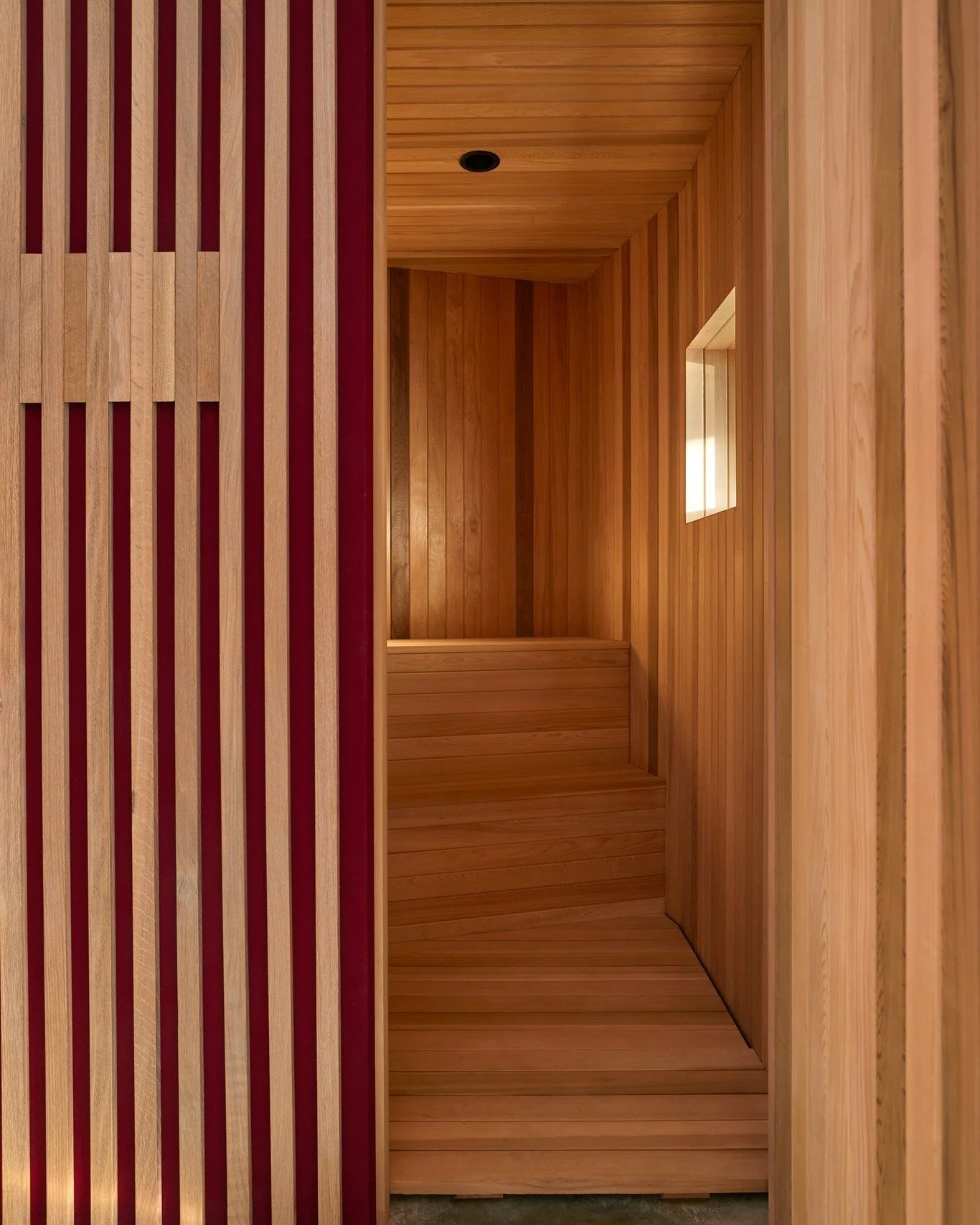 Tucked into the lower level of our China Pond residential project, the sauna is part of a recreational retreat designed for gathering, unwinding, and recharging.

Wood wraps the space, from slatted walls with sculptural hooks to the sauna&rsquo;s int