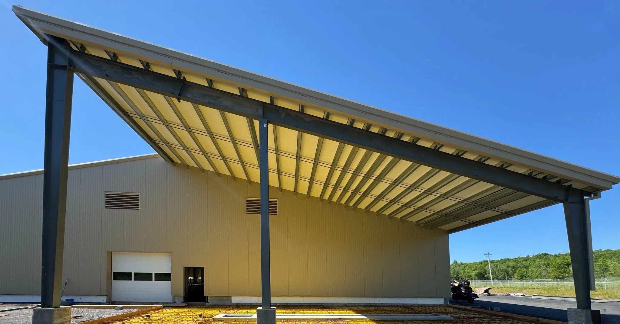 Sometimes construction photos take on a life of their own.

Bold geometry, bright reflections, and layers of structure create unexpected compositions at the Town of Bethel Garage as the building continues to take shape.

A reminder that architecture 
