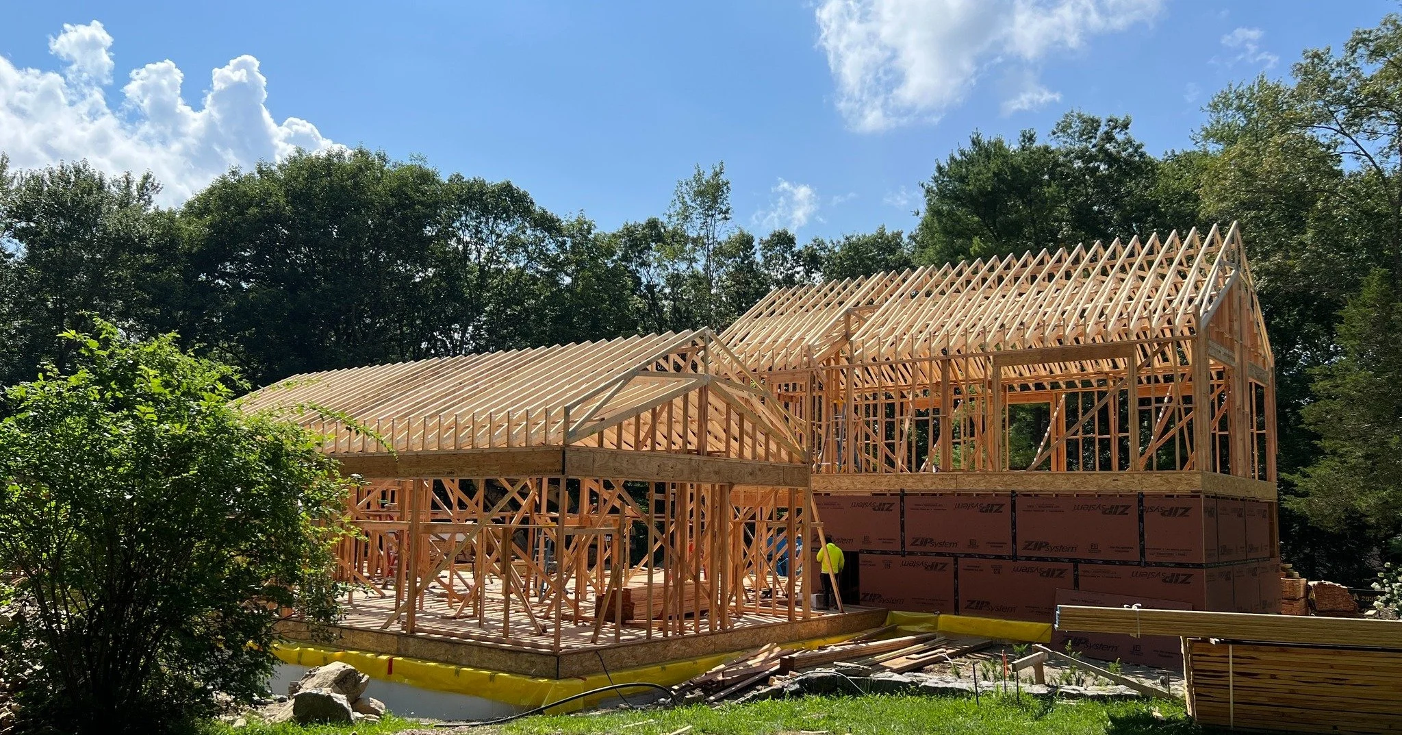The architecture begins to reveal itself in the framing: at Jaycox Pond House, the structure is taking shape, and with it, the relationship between the home&rsquo;s interconnected volumes, rooflines, and openings to the surrounding landscape.

This s