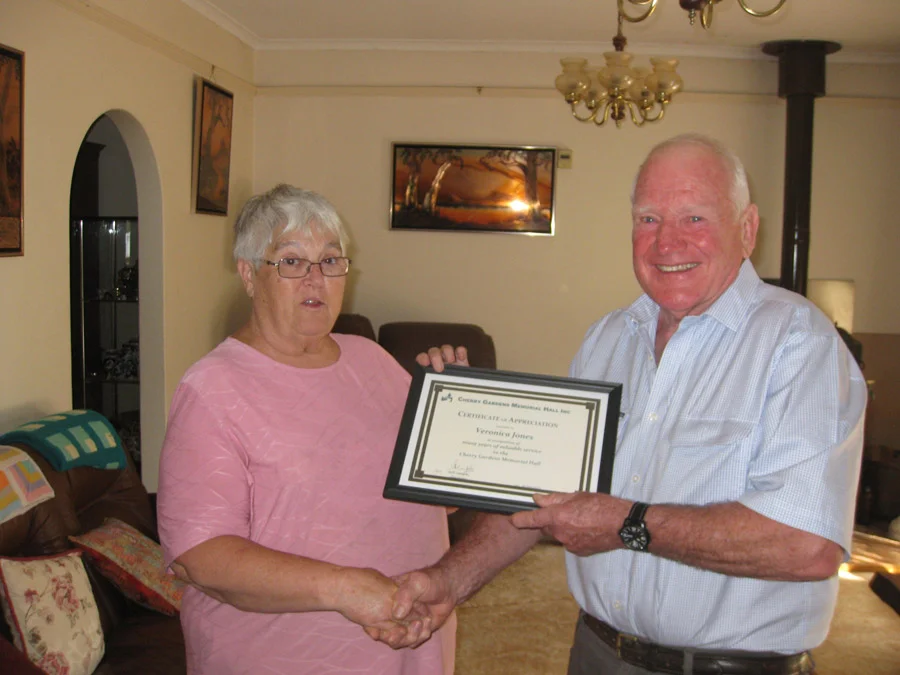 Terry presenting Veronica with her certificate.