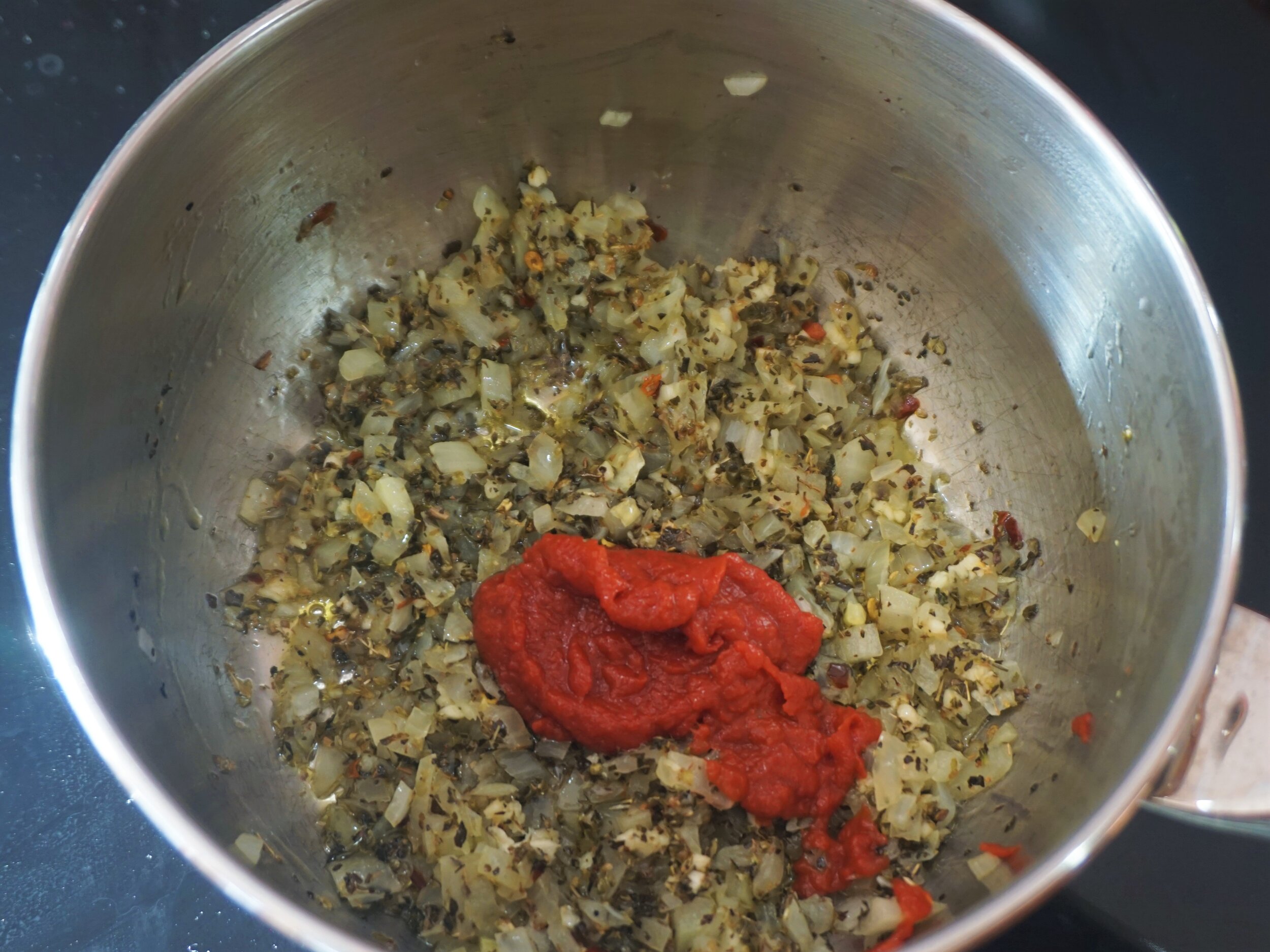 Youalways want to fry your tomato paste before you add the liquid ingredients.