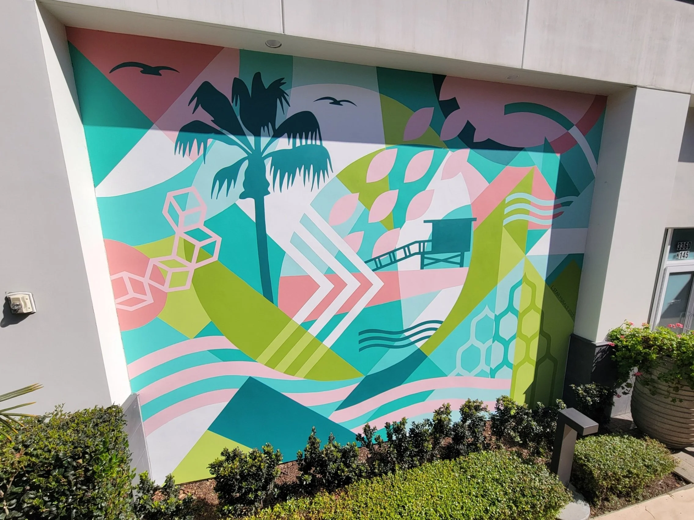 L Star Murals designed and painted this abstract geometric mural interpretation of beach life for large Manhattan Beach establishment, featuring the pier and classic Southern Cali vibes
