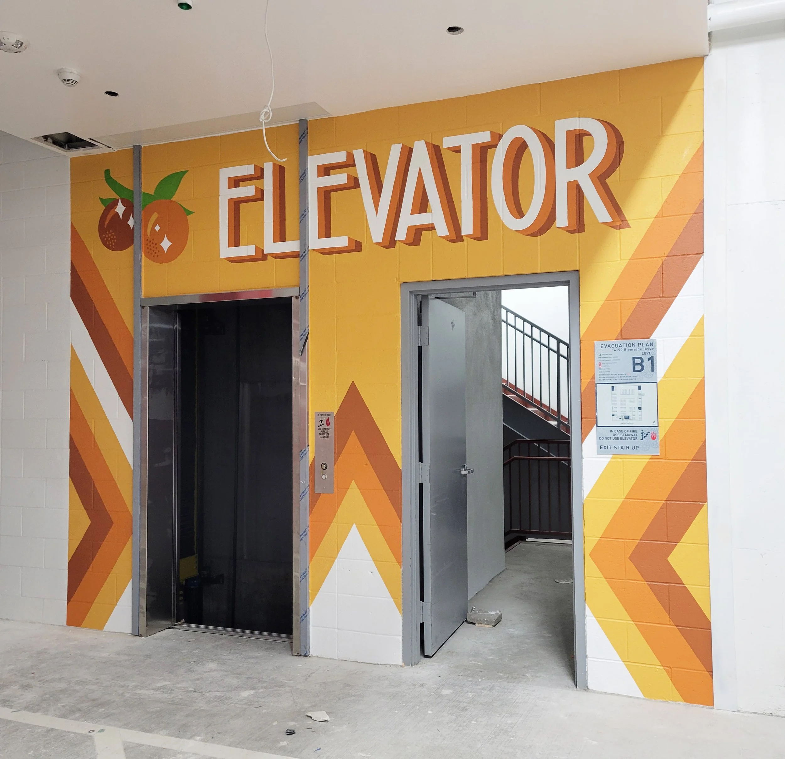 Retro wayfinding mural for elevator area