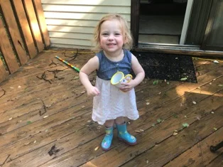 Just kidding - if you want a gross pix like that, then Google it. WARNING - you may vomit at what you see. Anyway, here's a cute picture of my Violet. Hmmm - See that broom in the back?