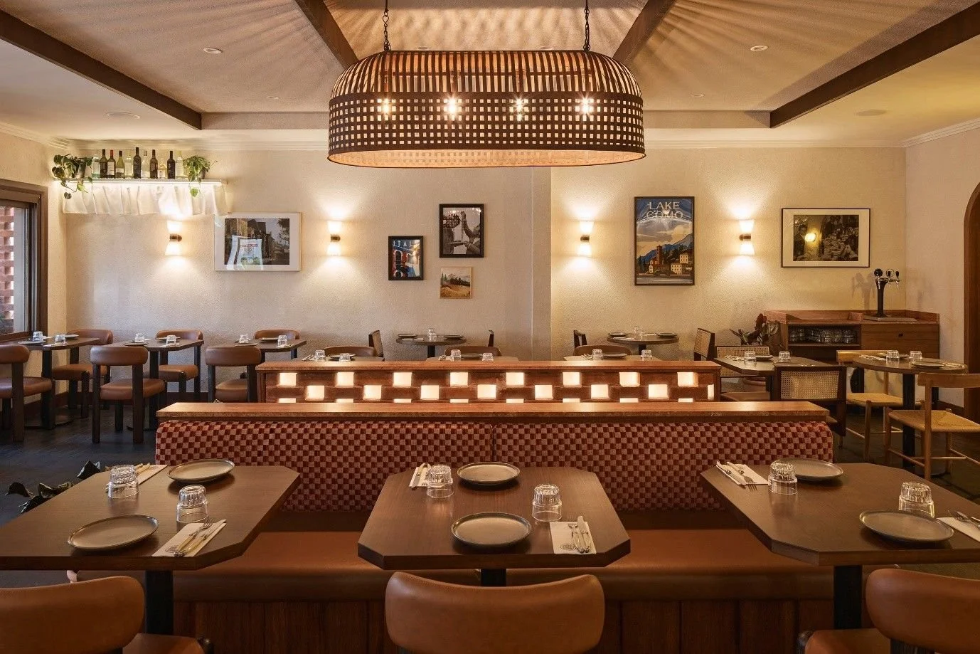 Cafe interior design with warm lighting and elegant dining spaces by Al & Co Haus of Design in Sydney