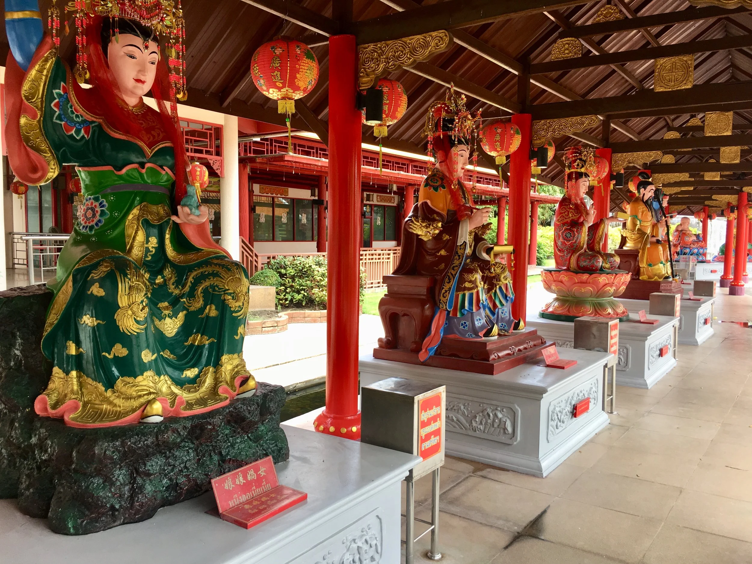 Chinese style buddha images at City Pillar Shrine in Suphan Buri
