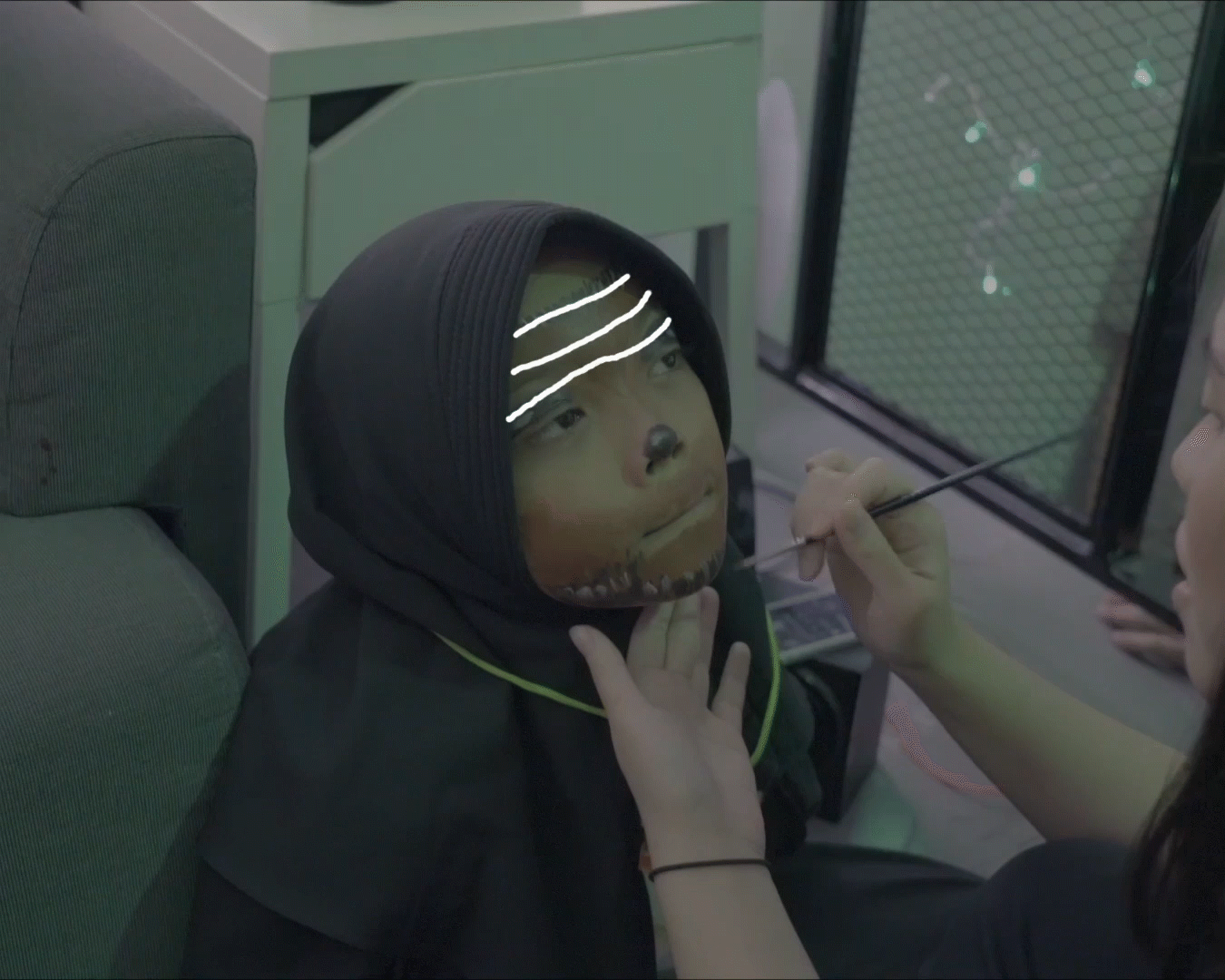 3rd Booth ‘Bachelor of Something Super’: Turning them into the characters of the story by painting their faces.