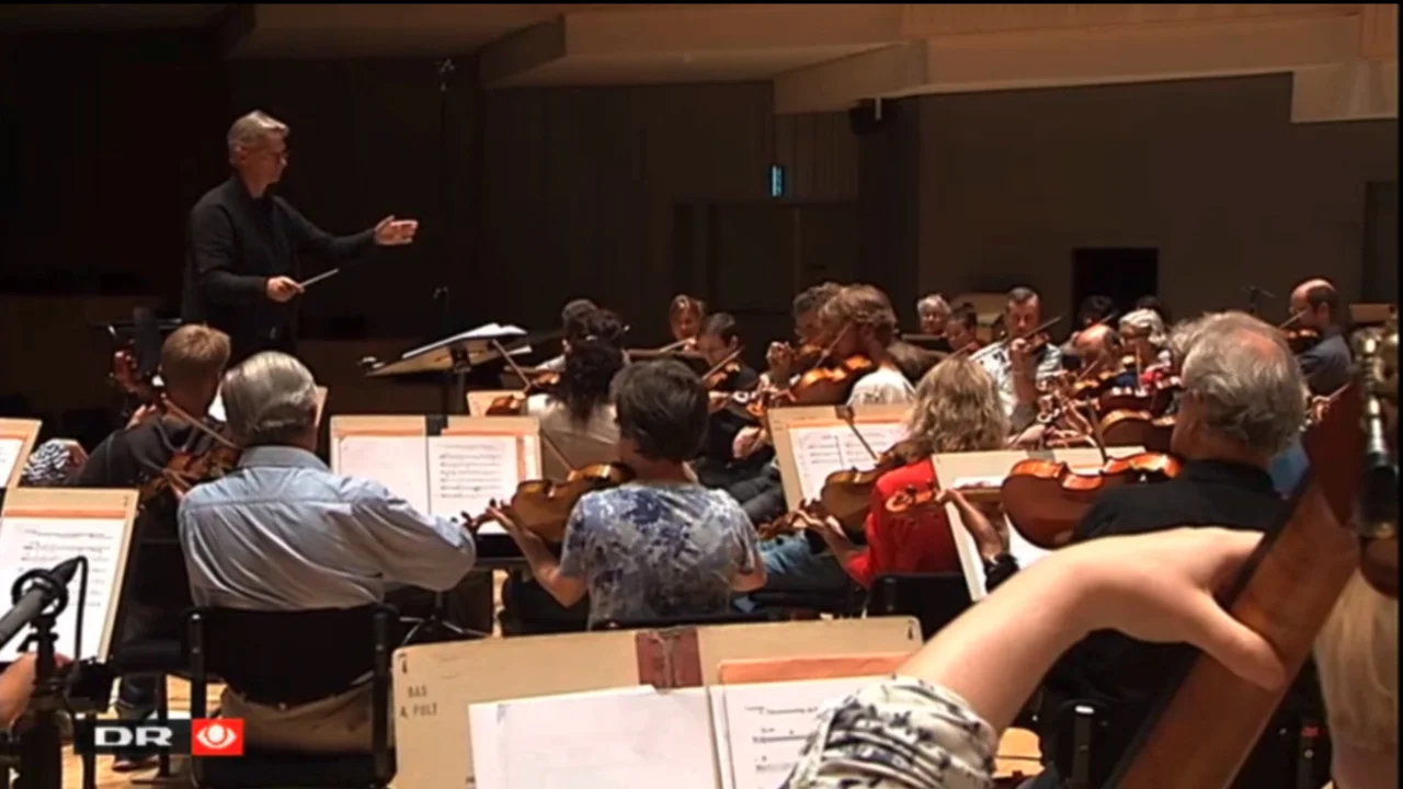 Aarhus Symphony Orchestra, Mette Nielsen (harp), David Strong (grand piano), and Søren Kinch Hansen (conductor) during the recordings of Ilan´s music