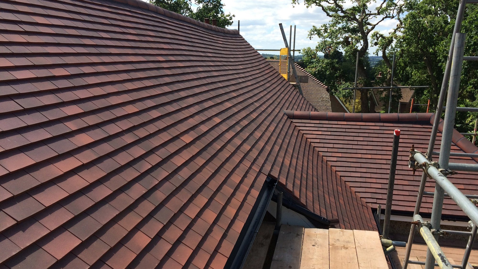 Davids Roofing Wimborne - tiled roof and scaffolding.jpg