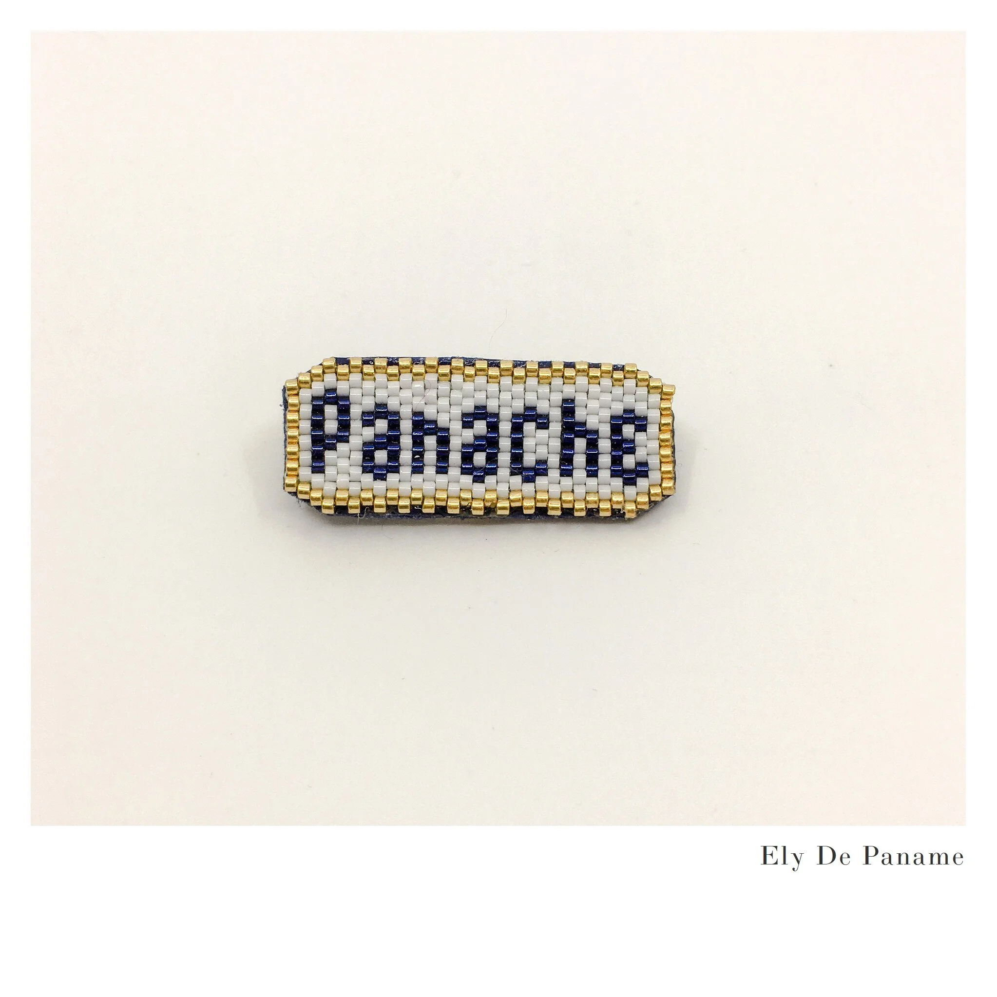 Broche "Panache" en perles tissées à la main