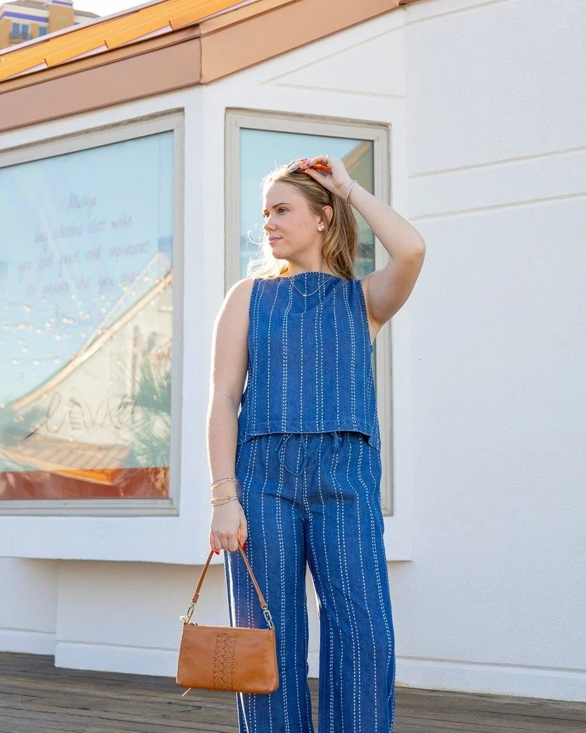 It&rsquo;s all in the details.
Soft, flowy fabric. Indigo stripes. The sweetest back-button moment.
This matching set was made for spring days that feel effortless. 

Shop the look at Envie Boutique.