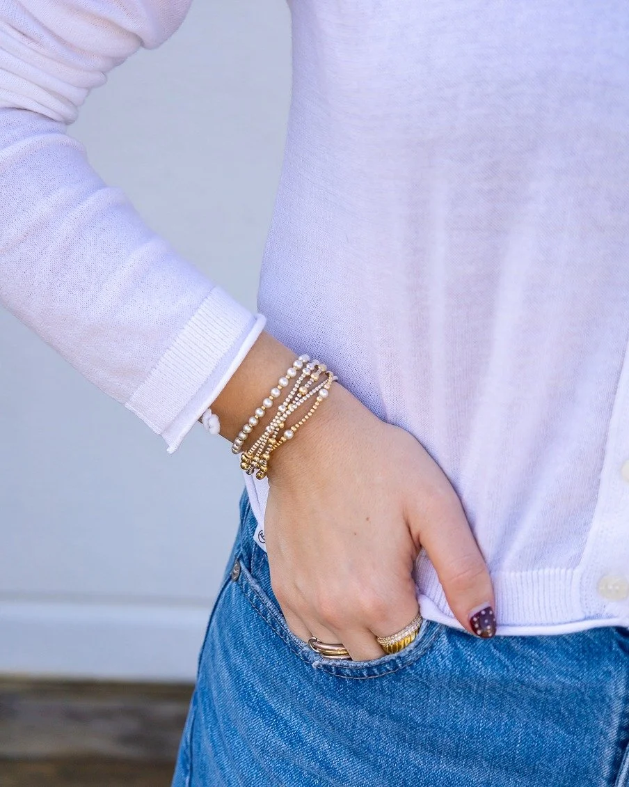 A good stack just pulls everything together ✨
Mix, match, layer, repeat &mdash; Enewton bracelets are made for everyday wear and effortless styling.

Shop your next stack at Envie Boutique