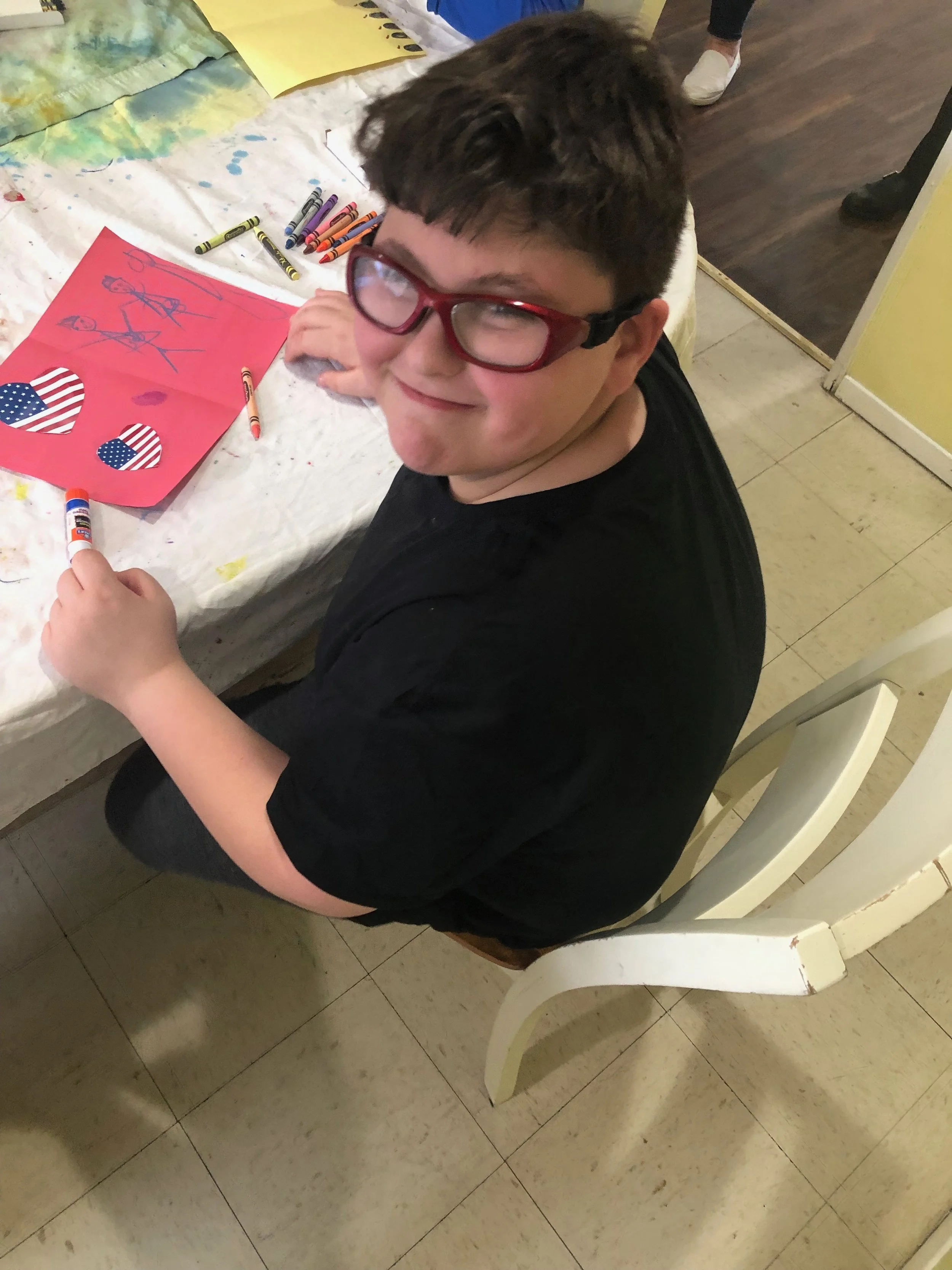 Merrick Group Home Youth are making thank you cards for the Saint Albans Veterans Home.