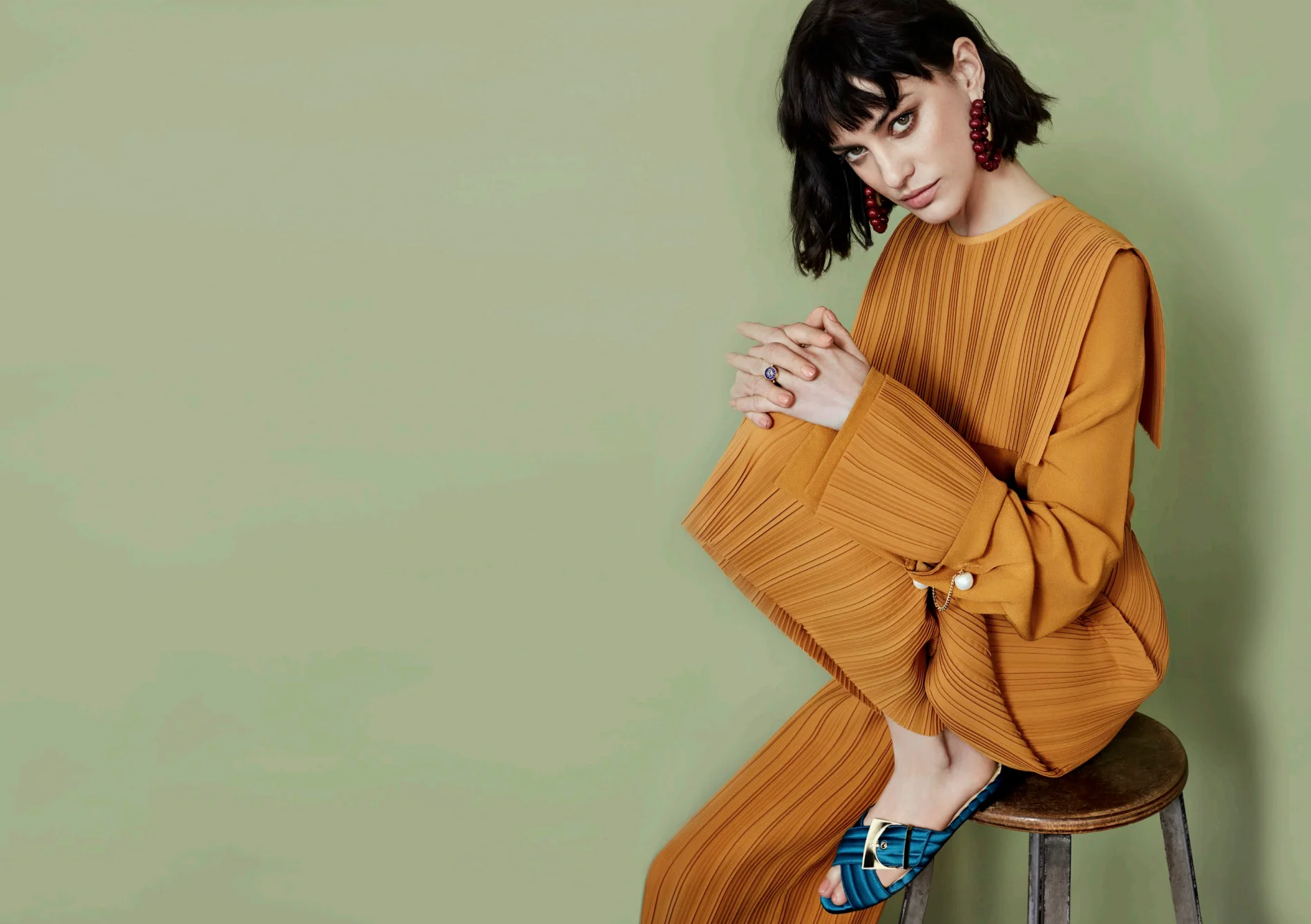 The Gloria: Flat slides with crescent-shaped buckle. Currently available in black leather . Teal satin coming soon.