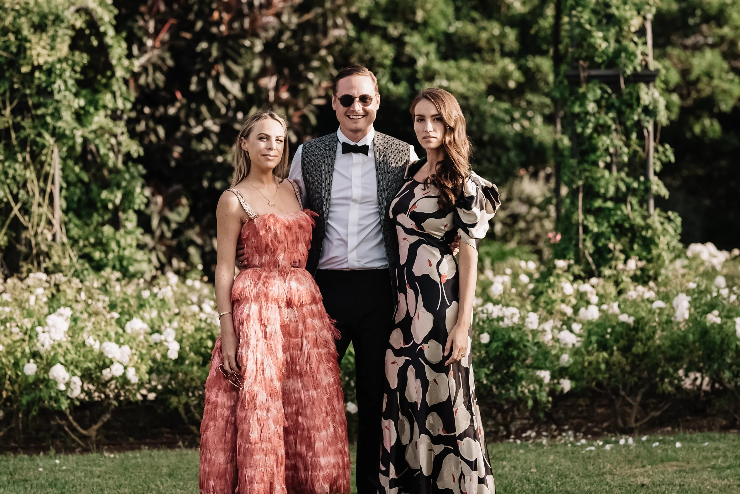 Chloe pictured at Morgan Curtis’s wedding with Laurence Chandler and Taylor Olson.