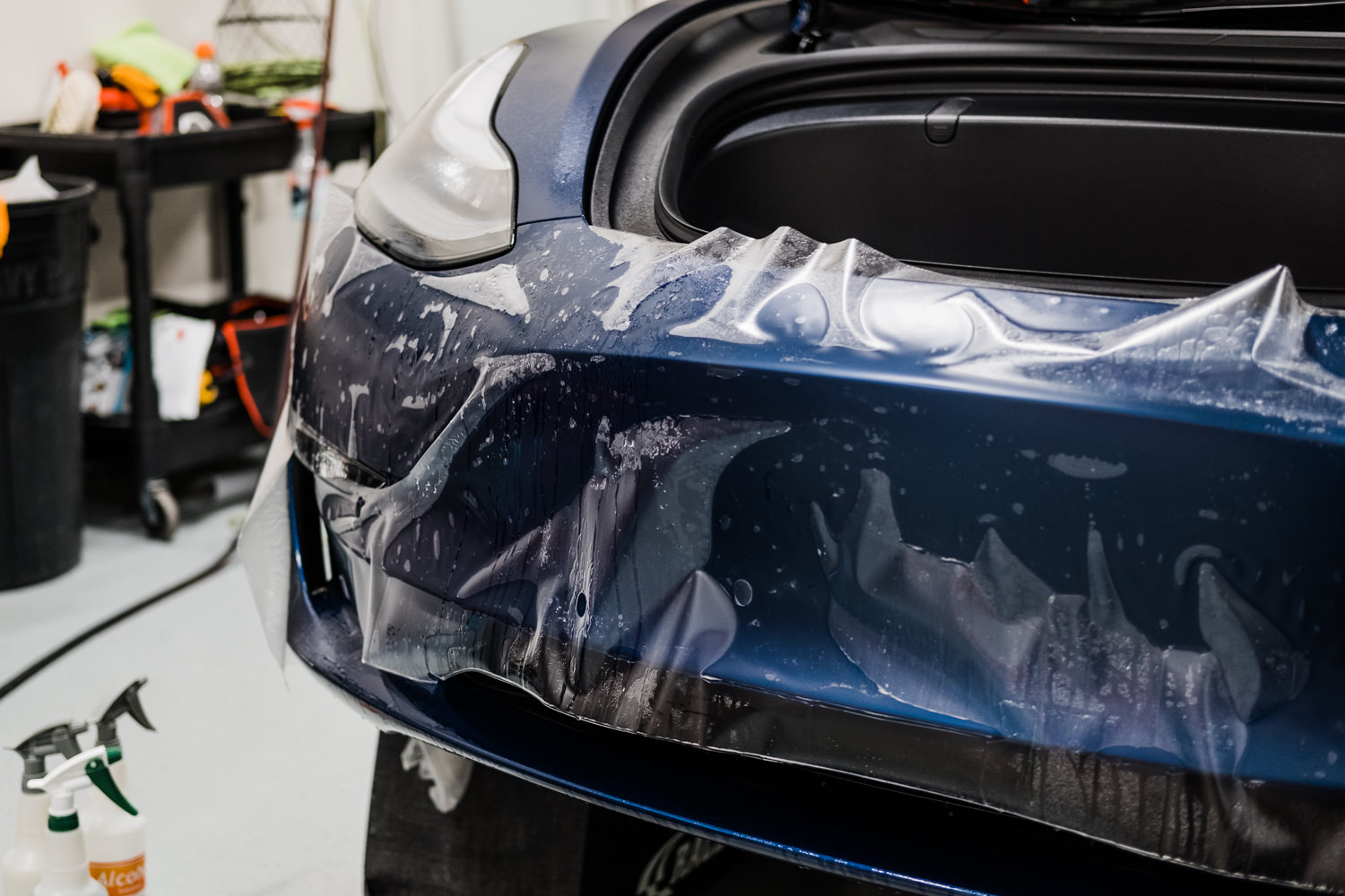 Hypnotic look at a Tesla Model Y getting a XPEL Paint Protection Film (PPF)  treatment