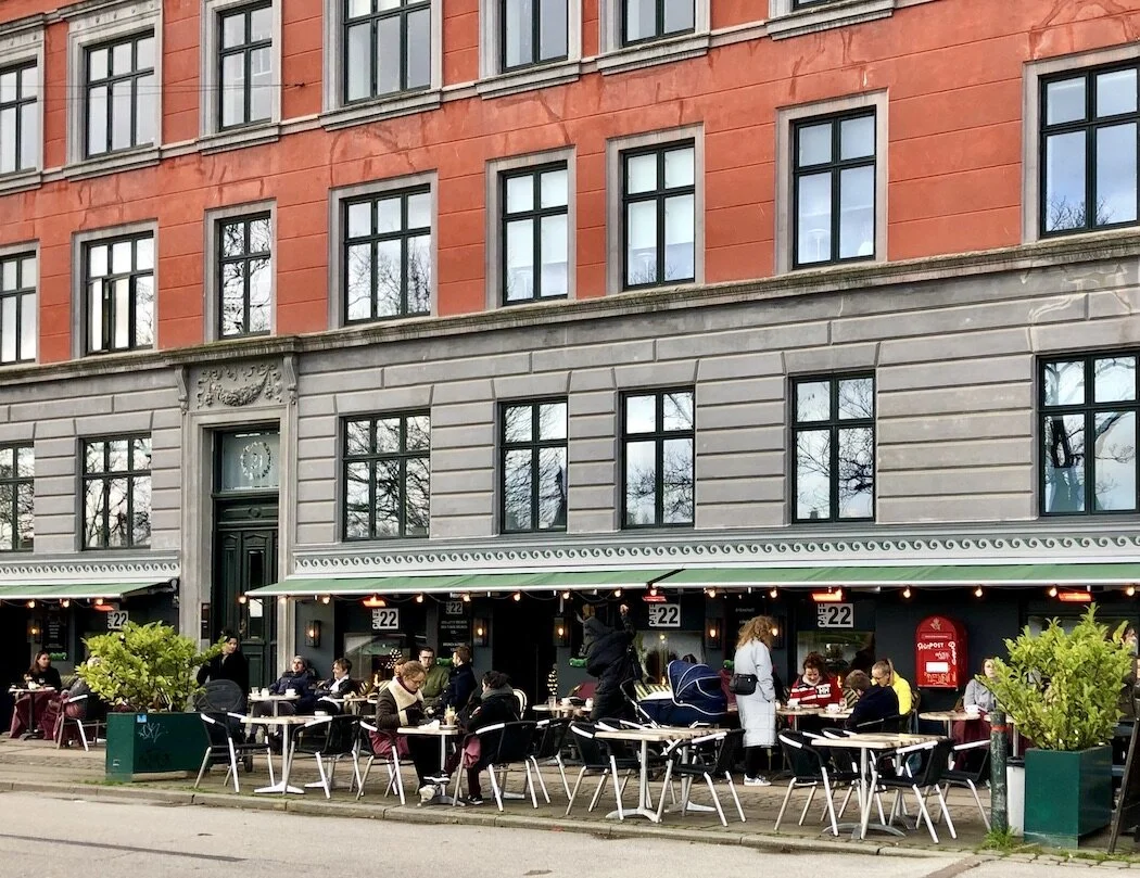 Café call in a winter coat