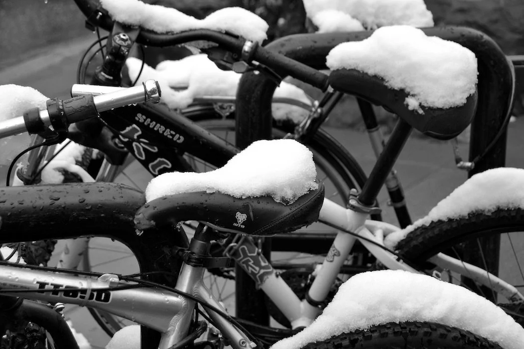 Black and White snow-covered bicycles