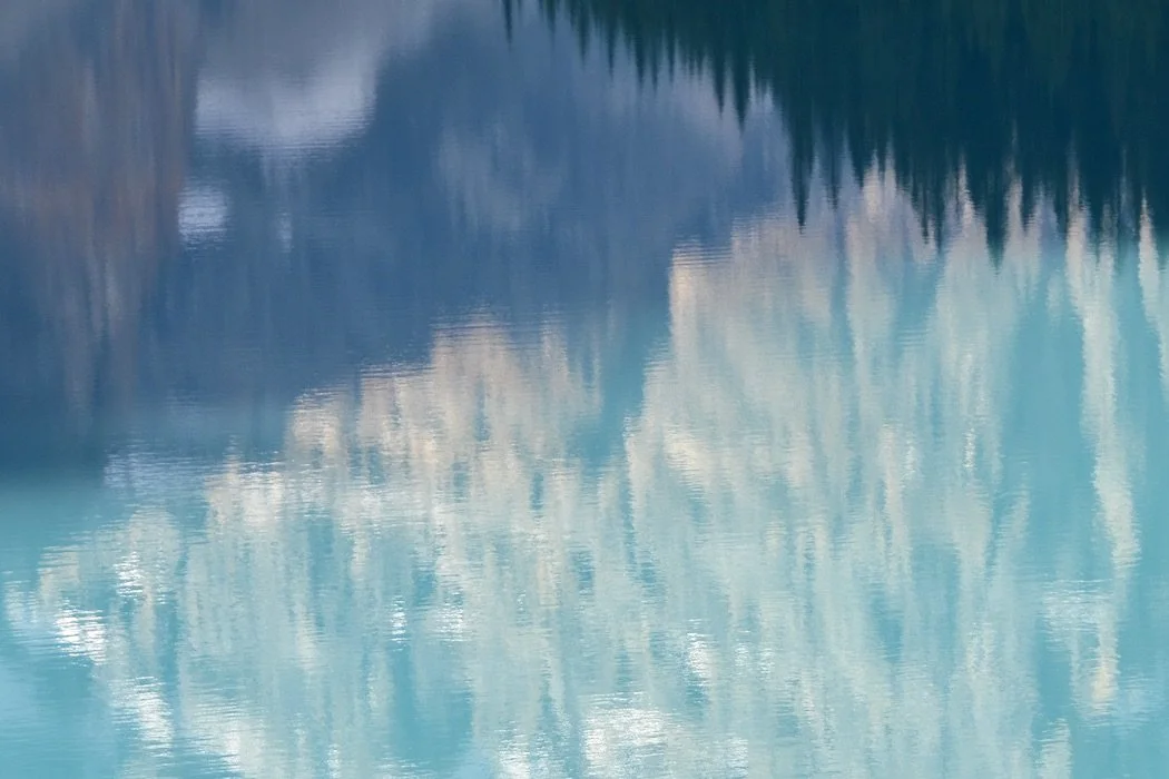 Reflection mountains in water Banff Canada