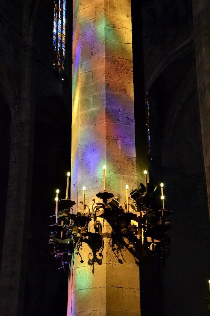 Reflection stained glass on stone pillar