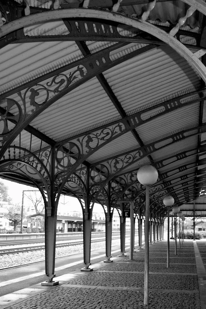 Black and White elaborate ironwork train station