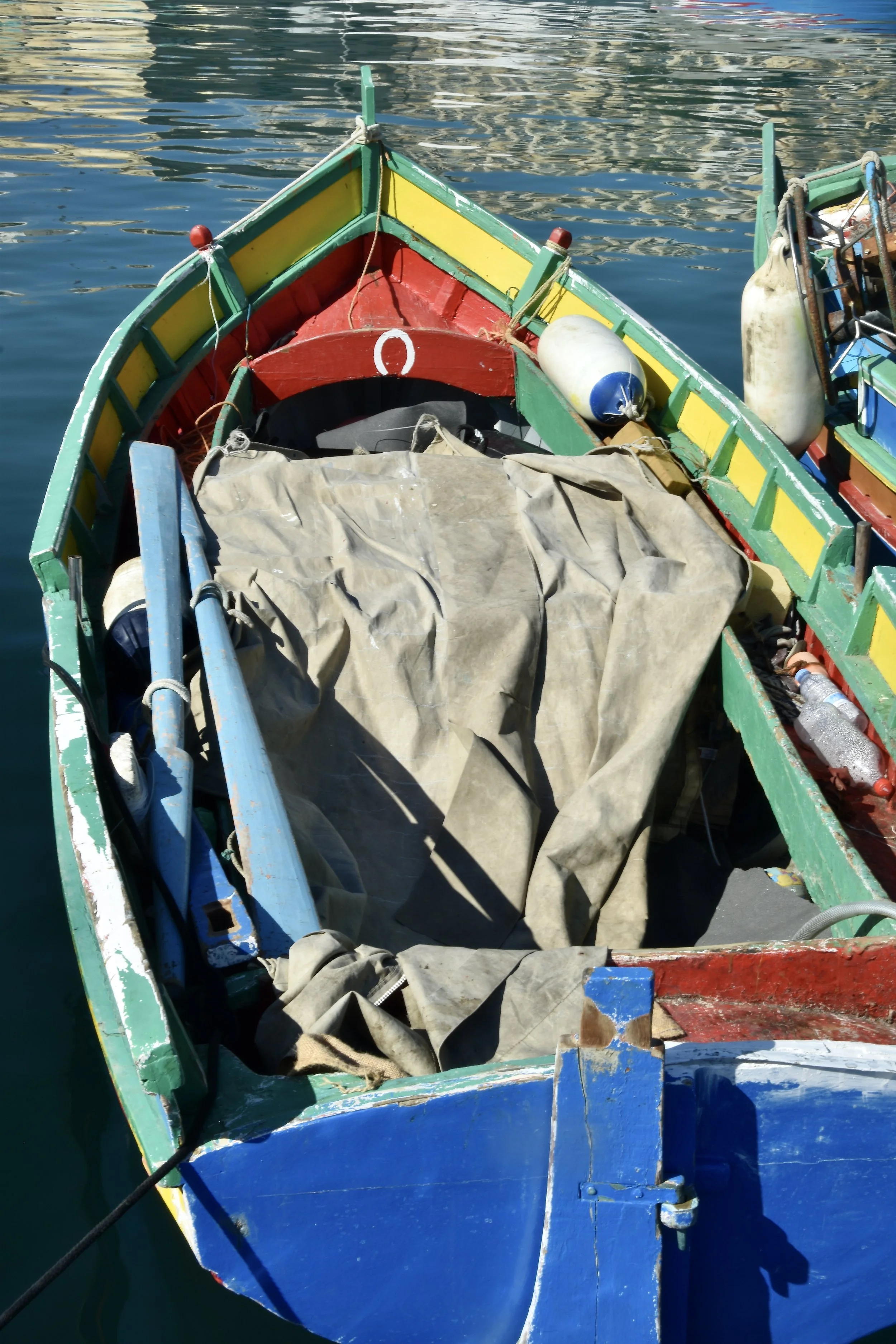 Boats Luzzu fishing boat Gozo Malta