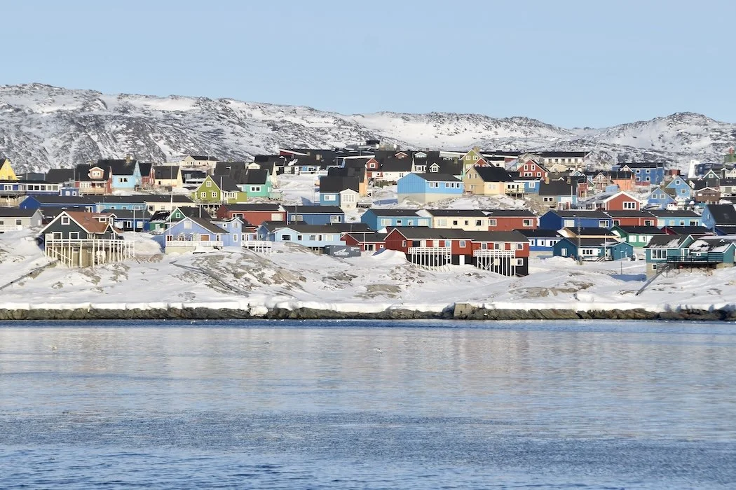 Colorful Ilulissat homes seen from the water