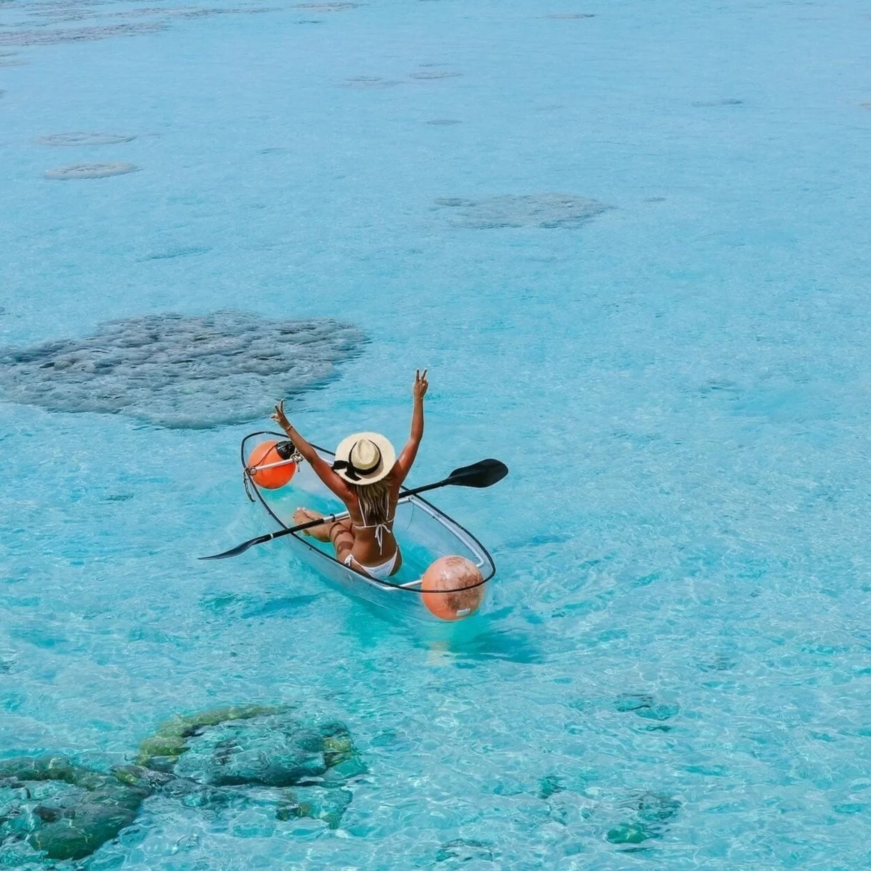 Woman Kayaking at Caribe Tesoro in Roatan