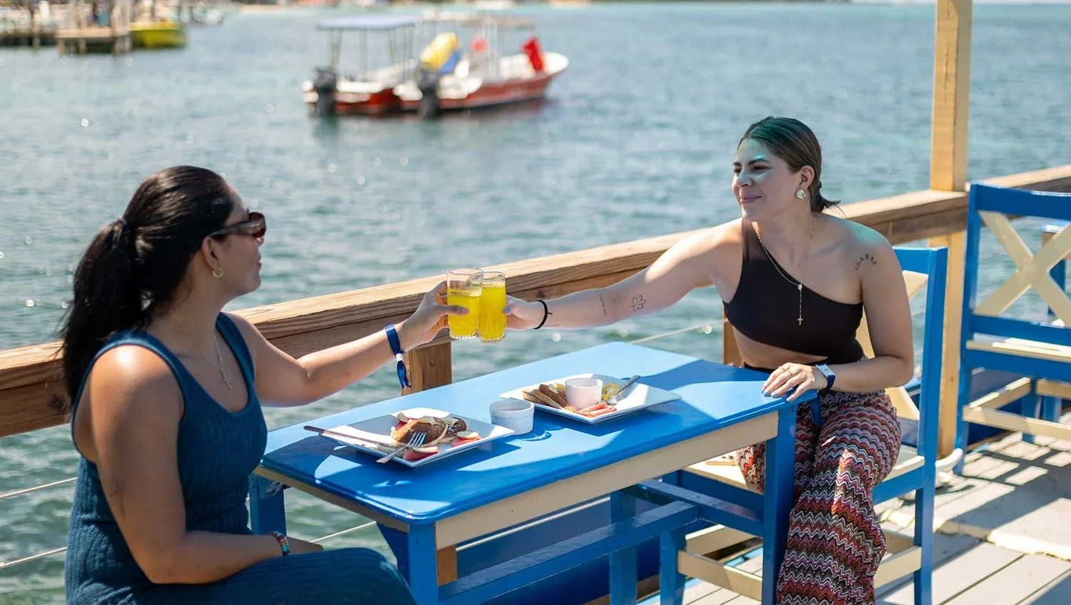 Two Women Having Lunch at the Restaurant at Caribe Tesoro