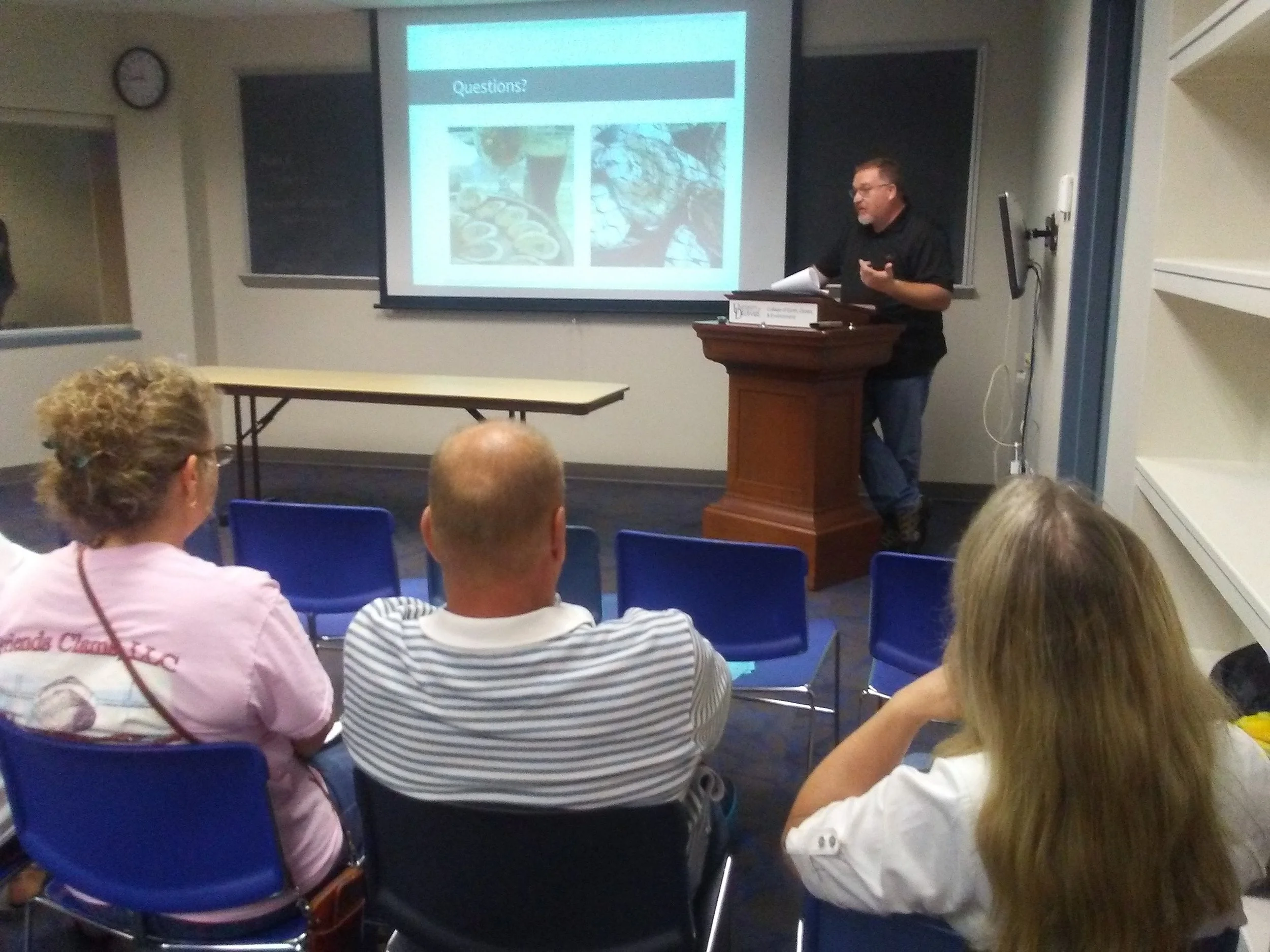 Dennis McIntosh speaking at shellfish growers meeting.