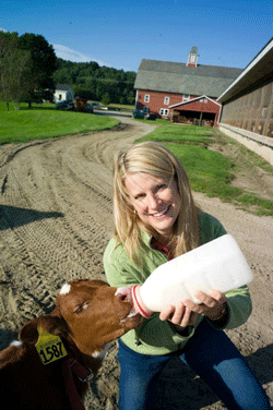 sm-Alison-feeding-calf-Cabot-Profile-Photo.gif