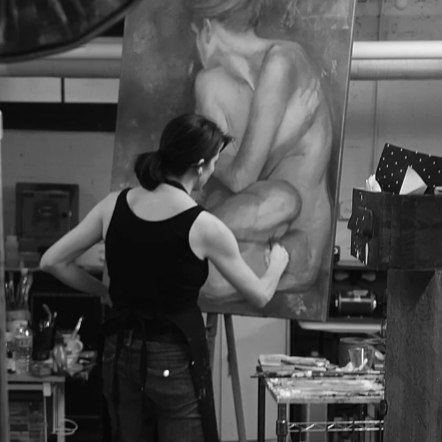 People paint and draw during the open sessions.