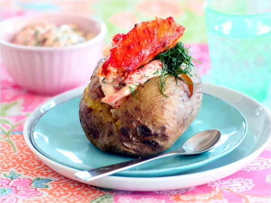 Baked potato with grilled king crab and Skagen Trout