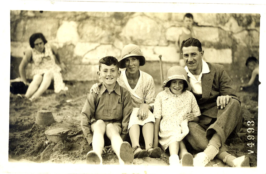 Family on the beach. (The V prefix probably means Viking Bay) ©Paul Godfrey